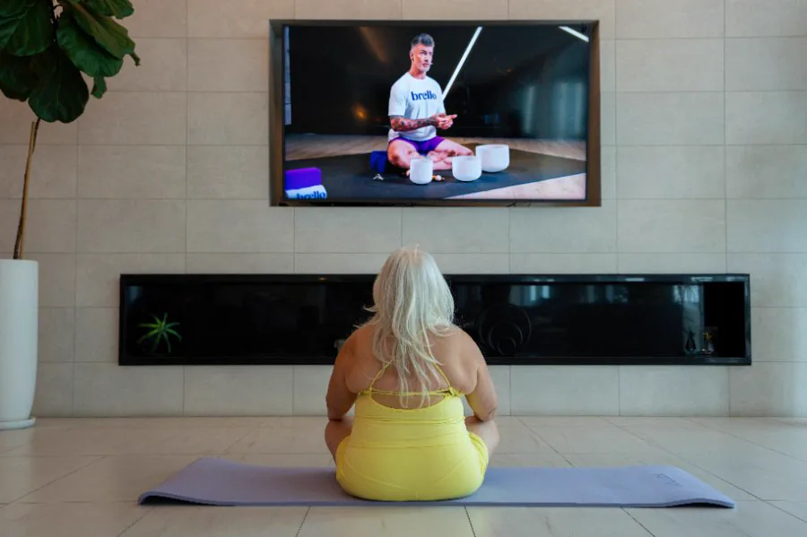 Member taking a Brello Rise class at home